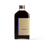 Front view of decaf Mountain Fir Smooth Coffee bottle